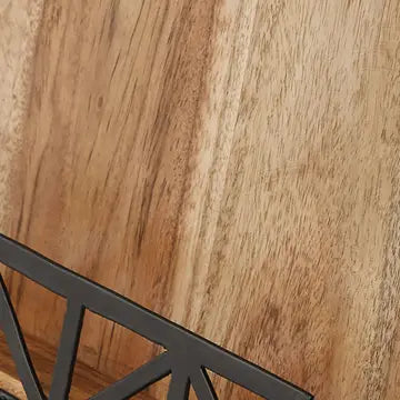 Close up of wood grain and metal holder.