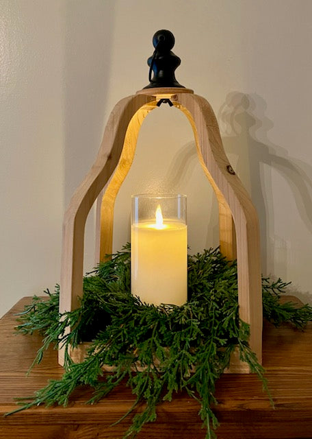 Shows the candle ring in our large Atlas lantern with LED Candle