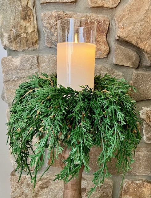 Emerald Falls candle ring shown on candle holder with LED Candle. Showing the draping look of the candle ring