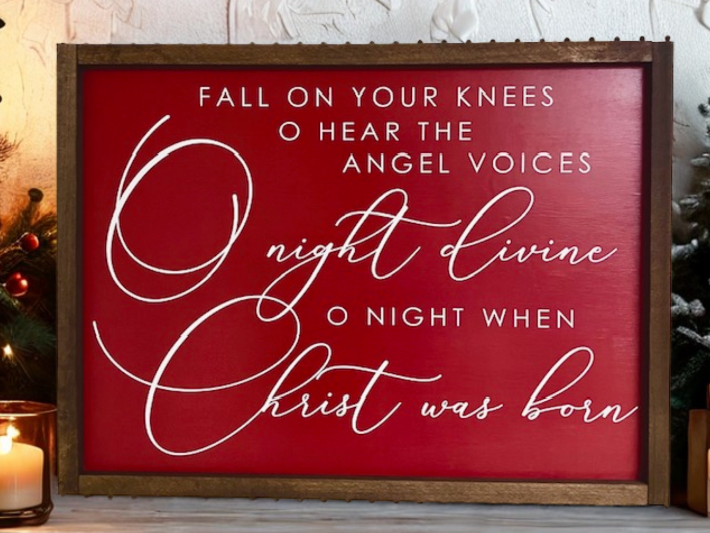 Decorative sign with Christmas lyrics on a red background, framed in wood.