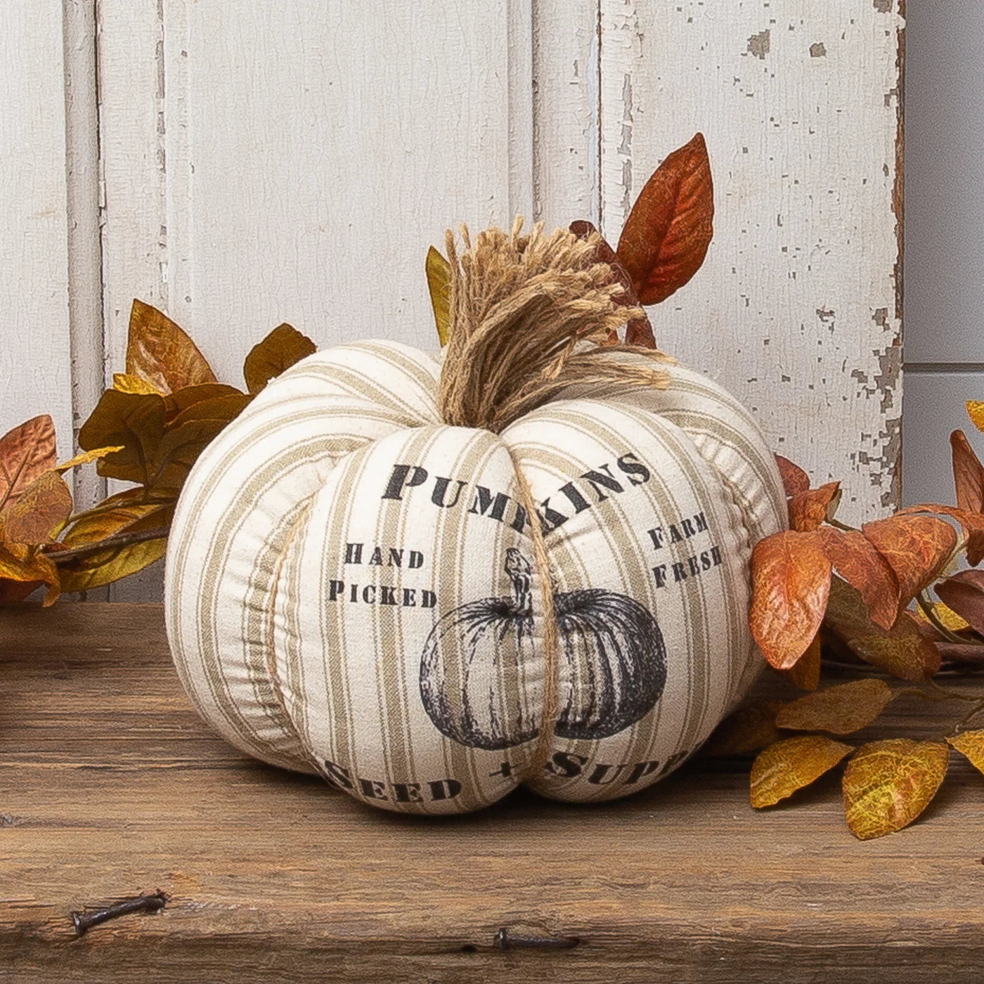 Tan grain sack stripe pumpkin with printed pumpkin design