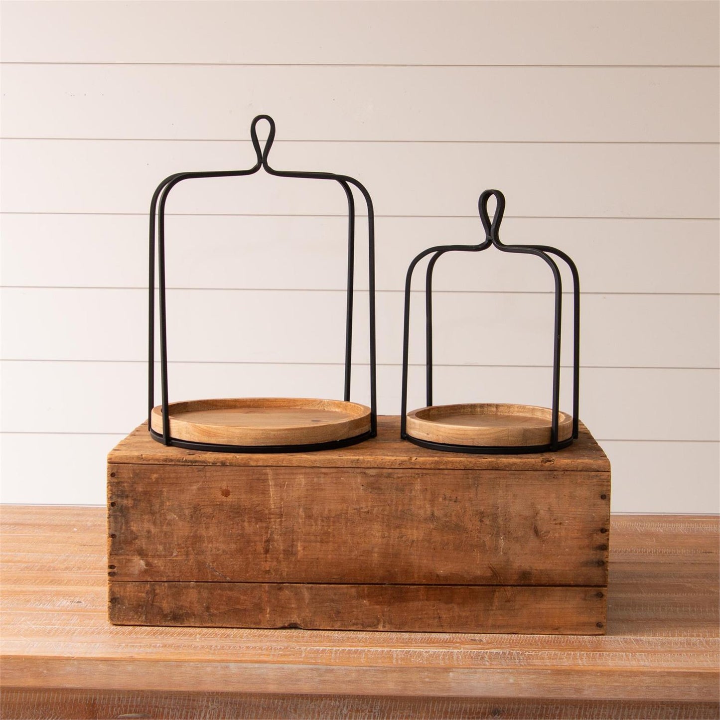 open lantern with balck metal with wood base. 2 sizes available, small and large.