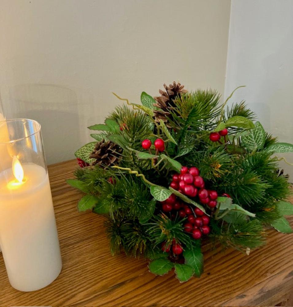 Pine and Berries pouf shown with LED Candle