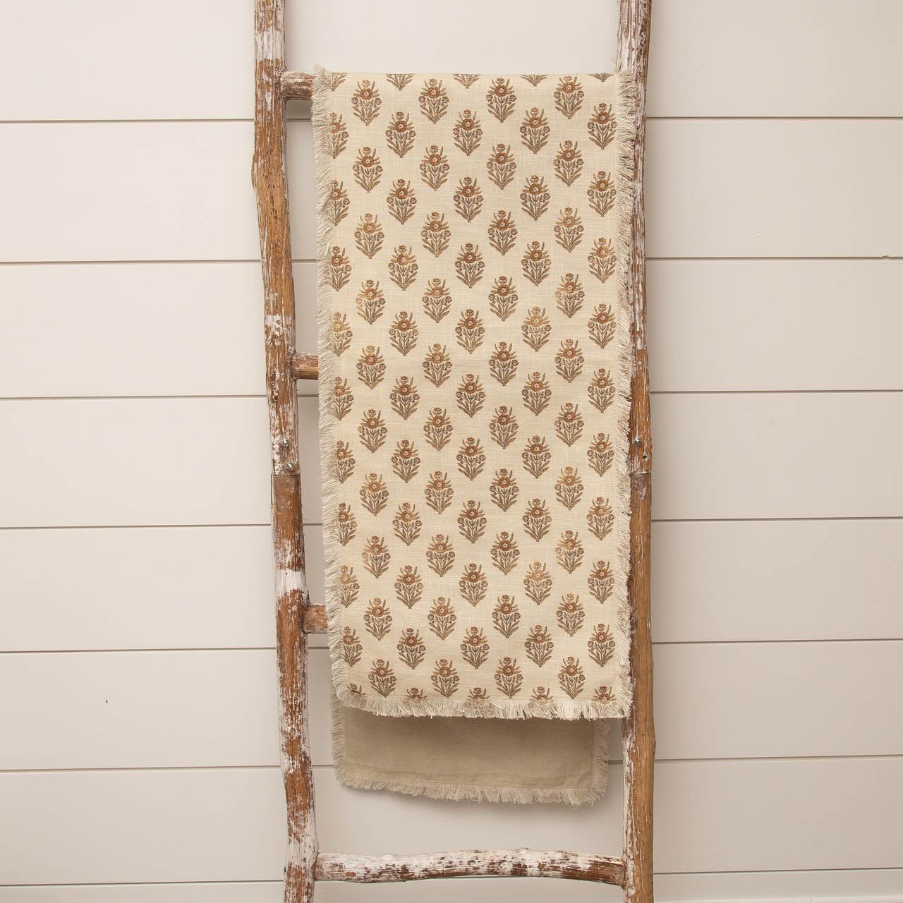 Silhouette Block Print Table Runner displayed over a wooden ladder