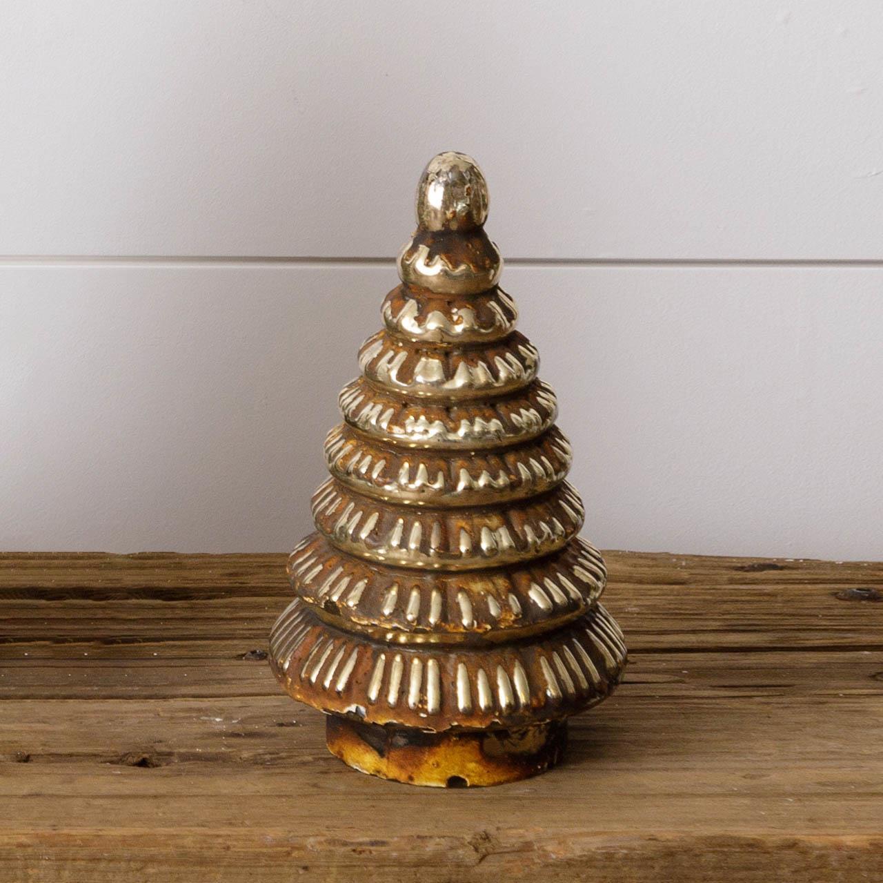 Small rust colored mercury glass pine tree shaped table top decor