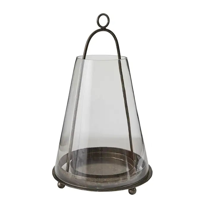 Unique metal lantern with a tapered glass enclosure