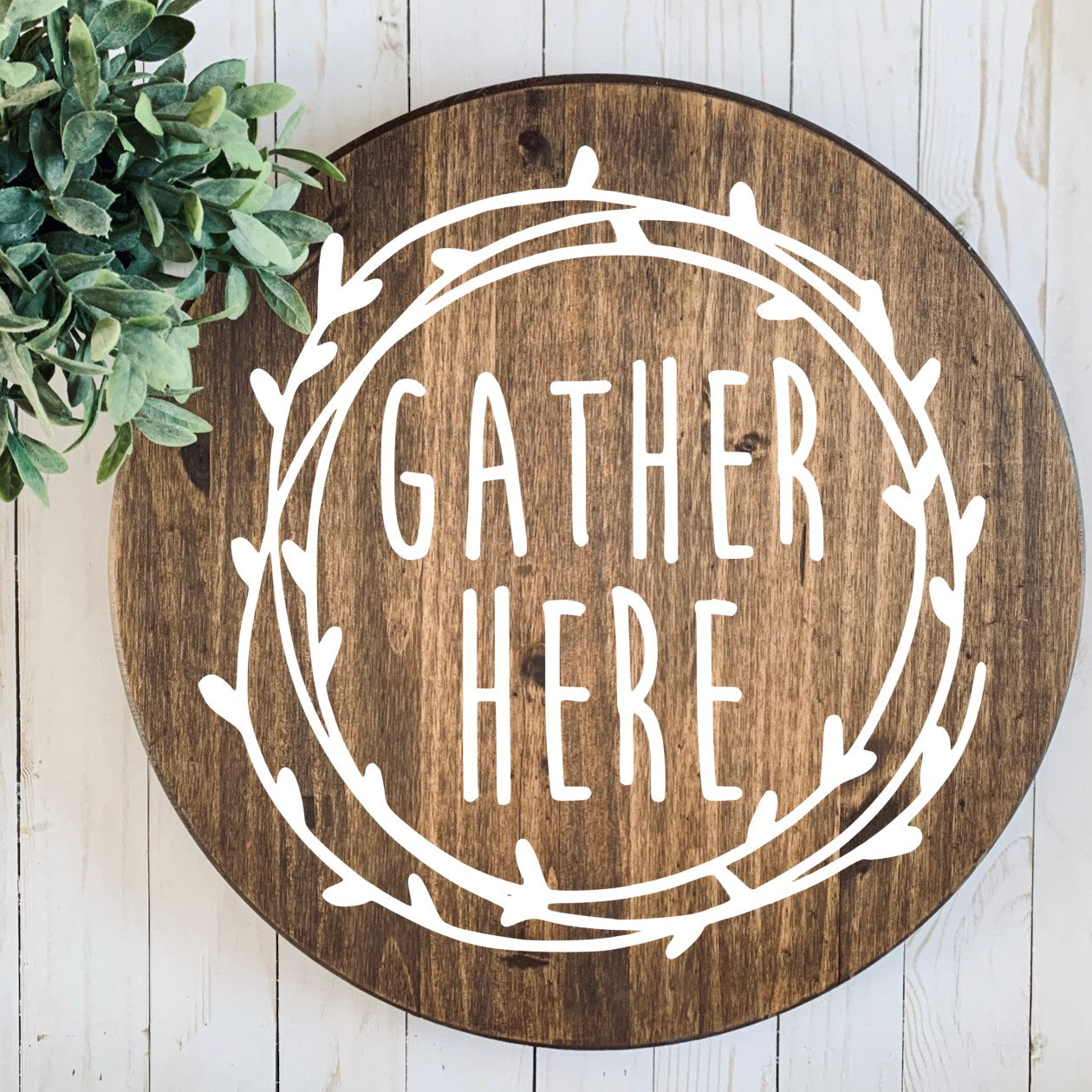 Gather here round stained sign