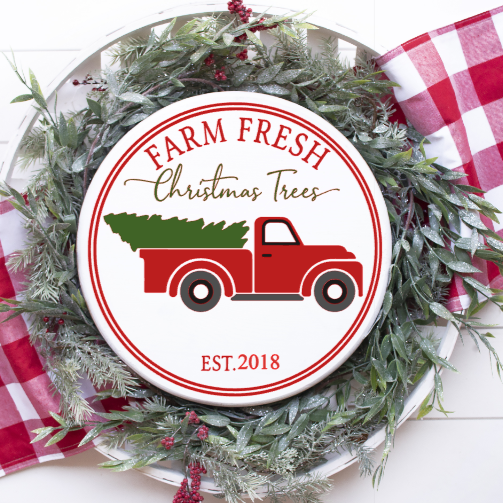 Red truck farm fresh Christmas trees with your choice of established date