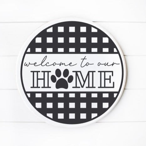 http://kinfolkandfriendsdecoranddesign.com/cdn/shop/products/Welcome_To_Our_Home_The_Dogs.jpg?v=1690582916