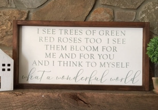 I see trees of green red roses too. I see them bloom for me and for you and I think to myself what a wonderful world framed sign