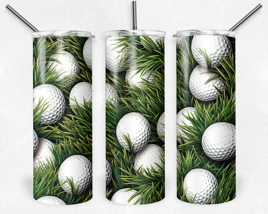 Beverage Tumbler with golf balls in grass 