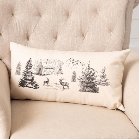 Natural Cotton canvas lumbar pillow with rustic cabin in a forest scene with deer in black print