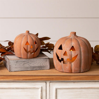 Ceramic Jack O Lantern in terra cotta finish. Your choice of small or large. 