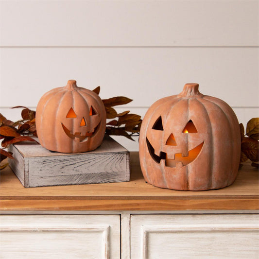 Ceramic Jack O Lantern in terra cotta finish. Your choice of small or large. 