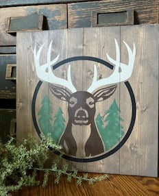 Plank sign with Buck deer with trees 
