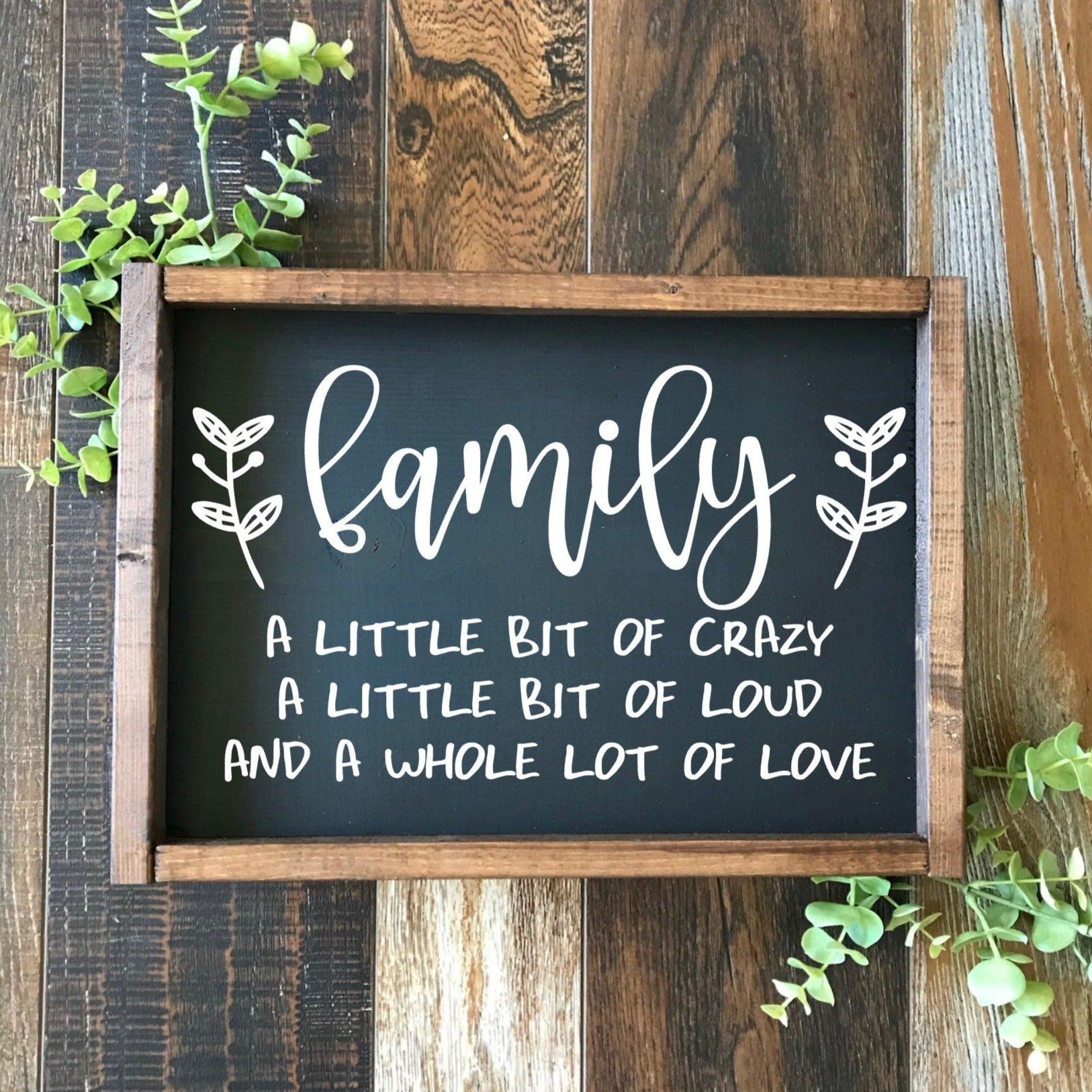 Family a little bit of crazy, a little bit of loud and a whole lot of love  framed sign black with white letters 