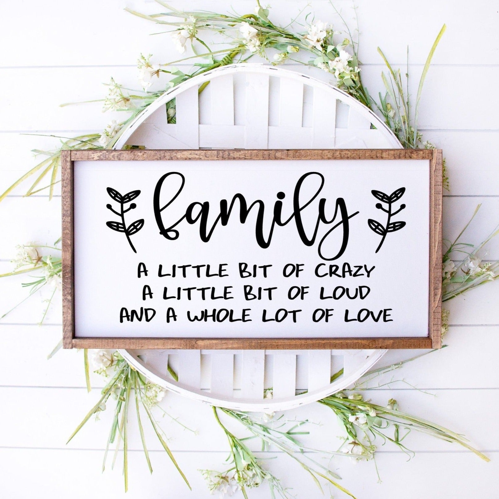 Family a little bit crazy, A little bit of loud and a whole lot of love framed sign white with black letters