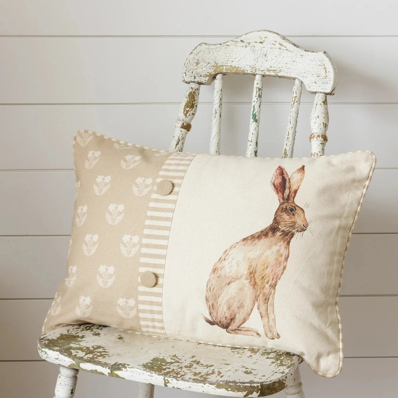 Floral pillow with rabbit 
