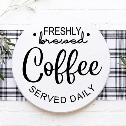 Fresh brewed coffee served daily round sign white with black letters 