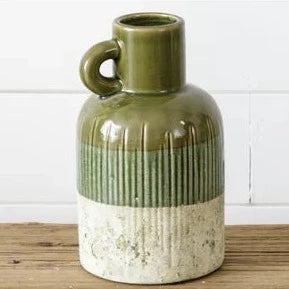 Green Jug with distressed bottom. 