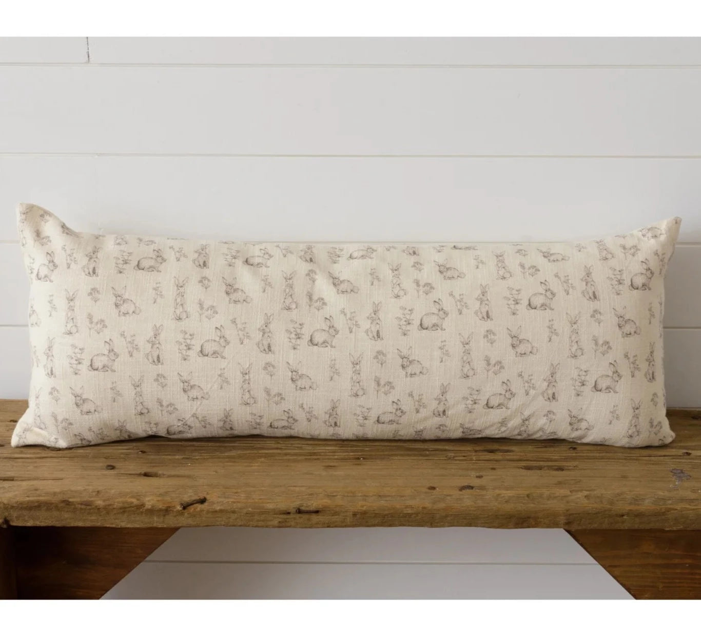 Reverse side of Rabbit and wildflowers lumber pillow 