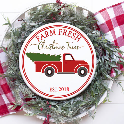 Red truck farm fresh Christmas trees with your choice of established date 