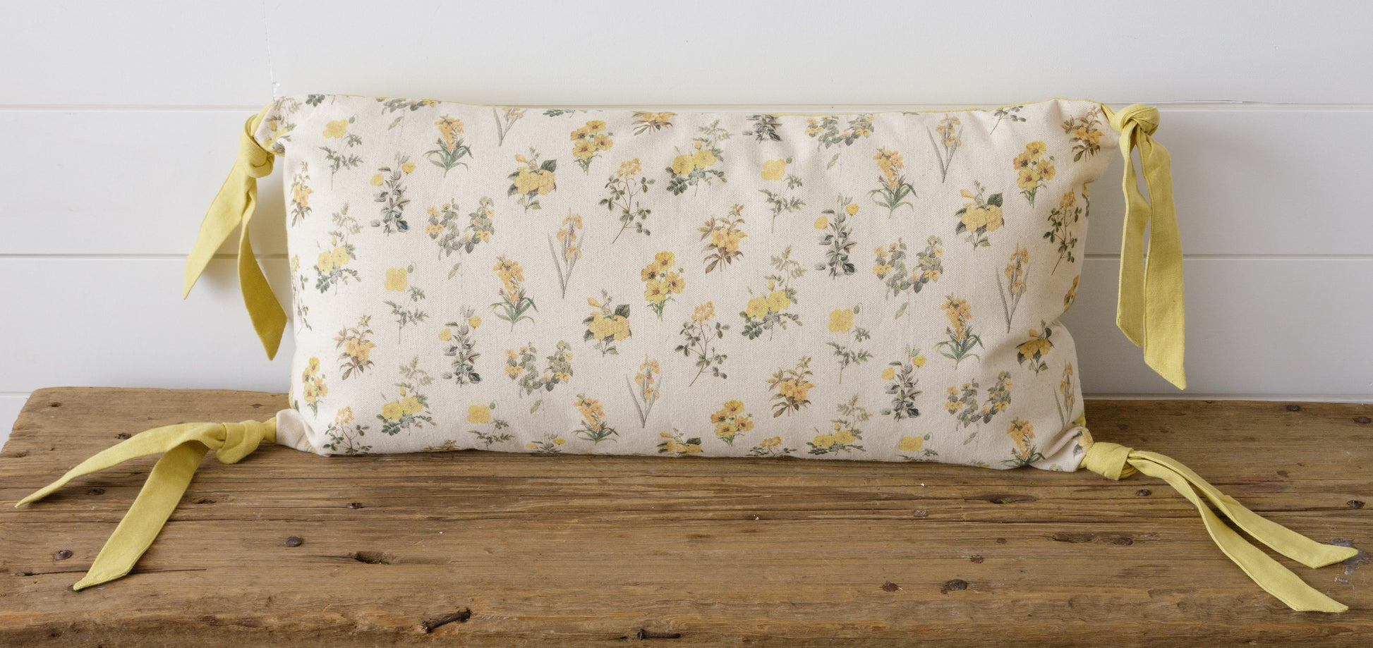 Yellow Flowers Lumbar Pillow With all over yellow flower bundles with yellow corner ties.  